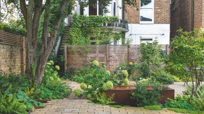 garden area with slated bench and blond wood with coffee table