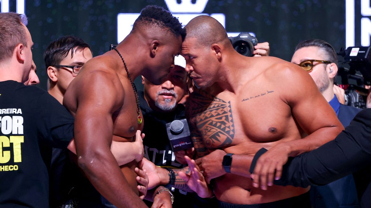 Francis Ngannou faces off with Renan Ferreira ahead of their fight.