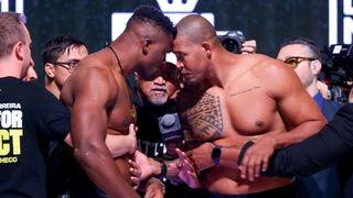 Francis Ngannou faces off with Renan Ferreira ahead of their fight.