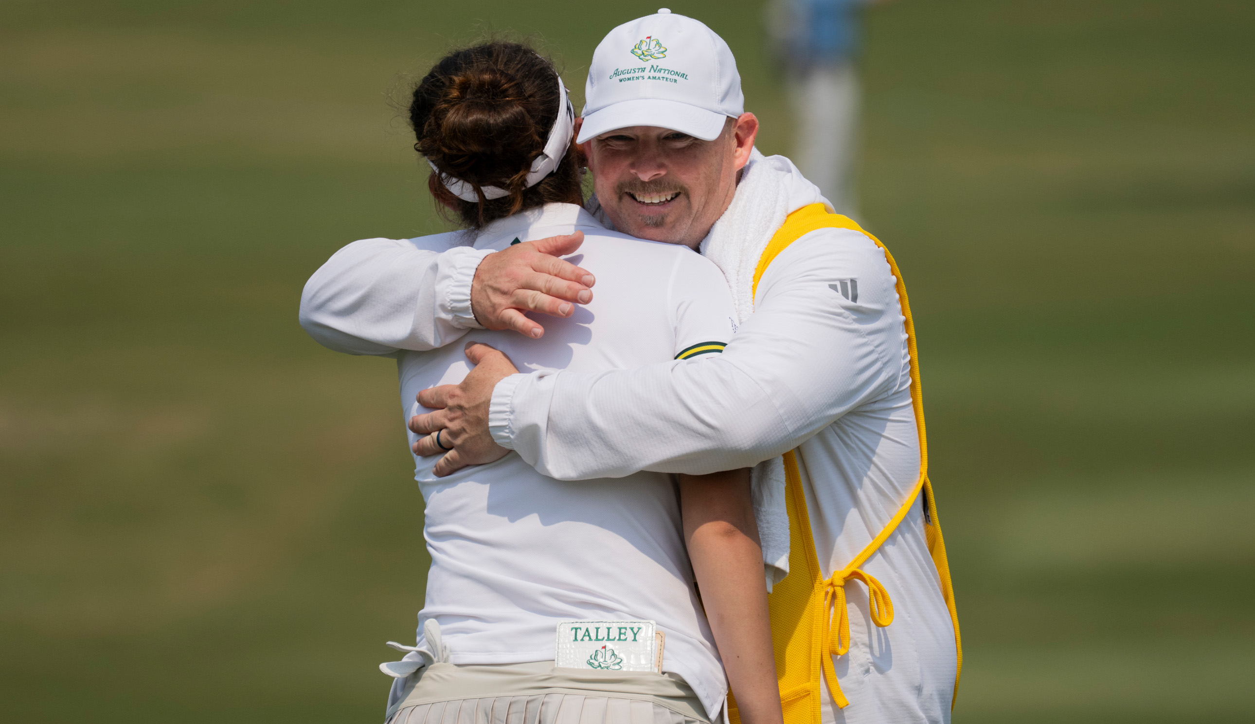 Asterisk Talley and her caddie Ryan Zak at Augusta National Women's Amateur