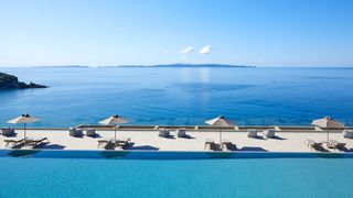 The freshwater infinity pool offers spectacular views across the Ionian Sea
