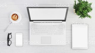 Blank laptop screen with phone and tablet