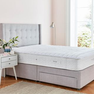 Silentnight mattress topper on neutral grey bed