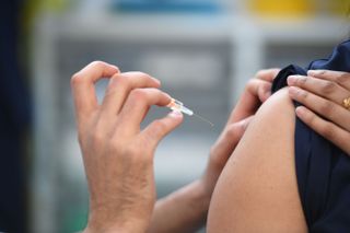Person receiving Covid-19 vaccine