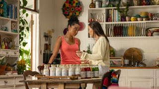 Chanell and Milla put their heads together in a light, bright, well stocked kitchen.