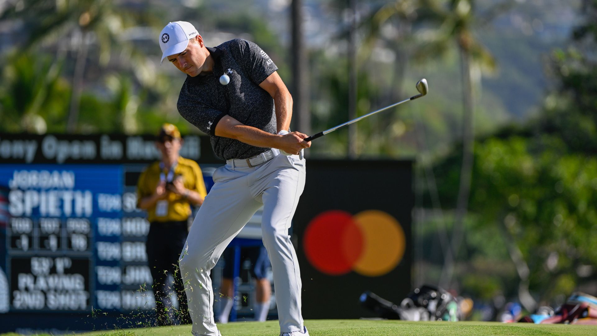 Jordan Spieth (USA) attempts a flop shot up tight from just off the green on 17 during Rd1 of the Sony Open at Waialae Country Club on January 12, 2023 in Honolulu, Hawaii.