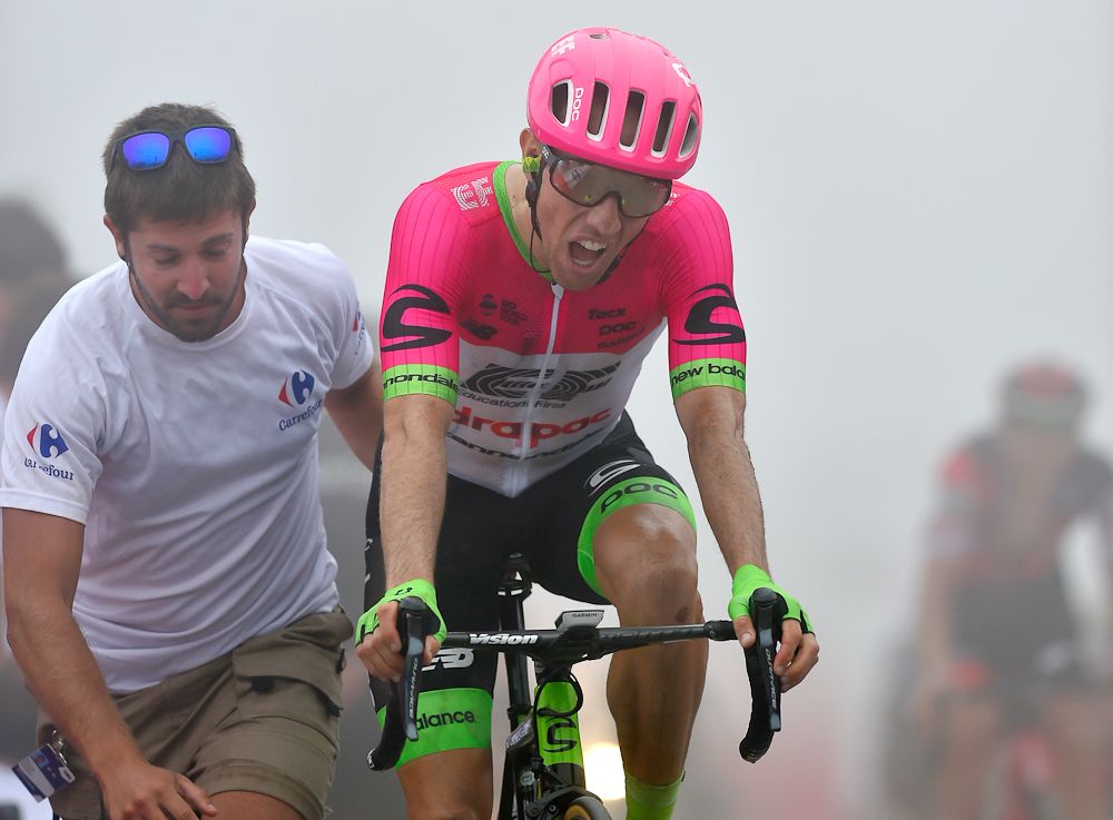 Michael Woods shows the pain of his effort to win stage 17 at the Vuelta