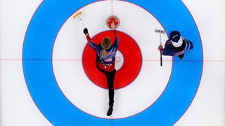 Victoria Persinger (L) and Christopher Plys of Team United States compete against Team Norway during the Curling Mixed Doubles Round Robin ahead of the Beijing 2022 Winter Olympics at National Aquatics Centre on February 03, 2022 in Beijing, China. 
