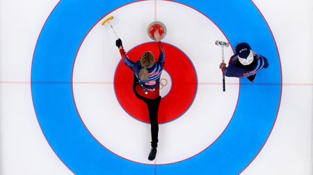 Victoria Persinger (L) and Christopher Plys of Team United States compete against Team Norway during the Curling Mixed Doubles Round Robin ahead of the Beijing 2022 Winter Olympics at National Aquatics Centre on February 03, 2022 in Beijing, China. 
