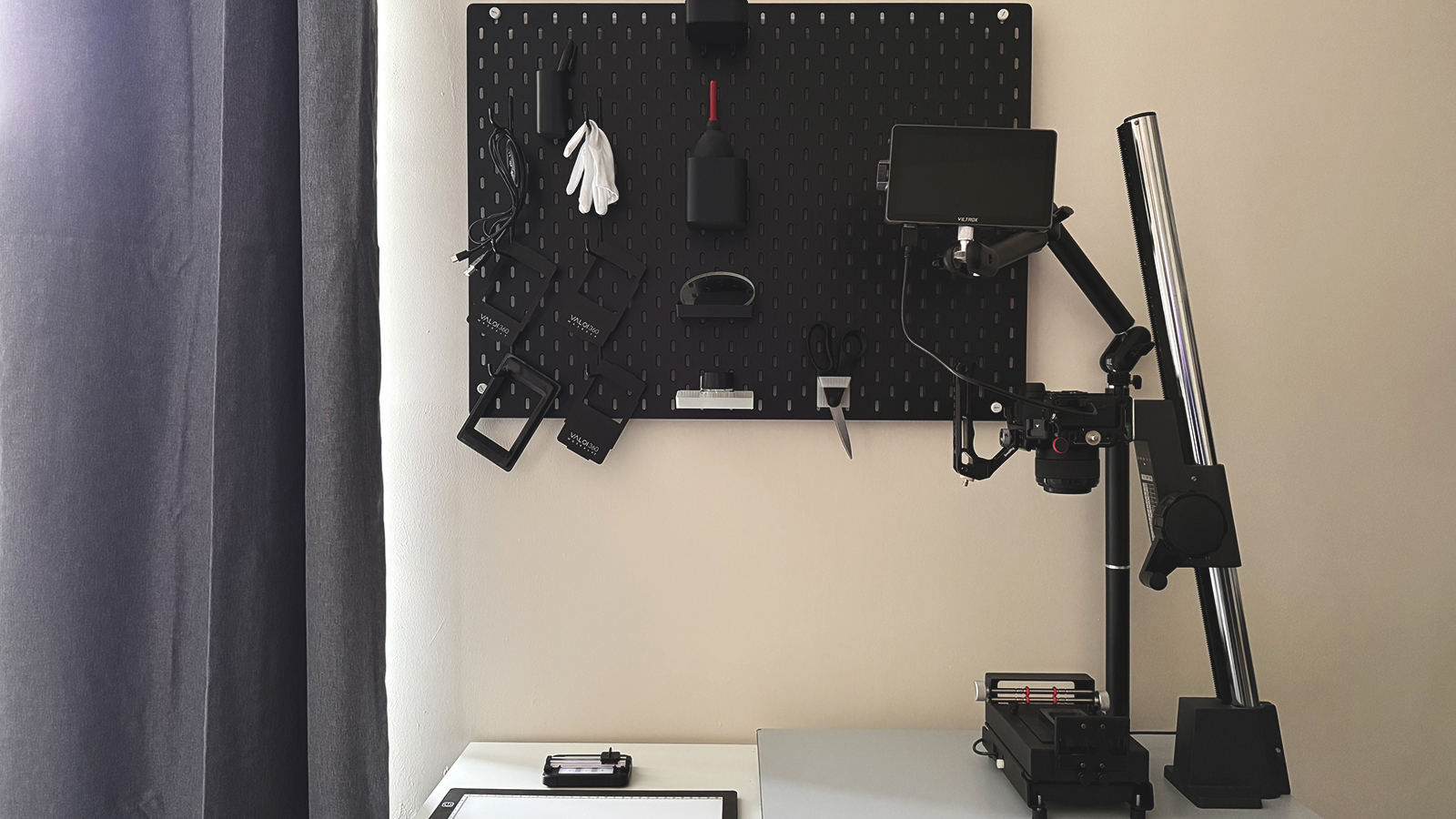 A selection of home film developing equipment and chemicals.