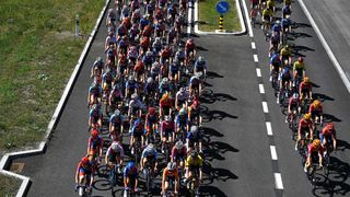 VERCORIN, SWITZERLAND - SEPTEMBER 07: A general view of the peloton competing during the 3rd Tour de Romandie Feminin 2024, Stage 2 a 101.9km stage from Chippis to Vercorin 1319m / #UCIWWT / on September 07, 2024 in Vercorin, Switzerland. (Photo by Luc Claessen/Getty Images)
