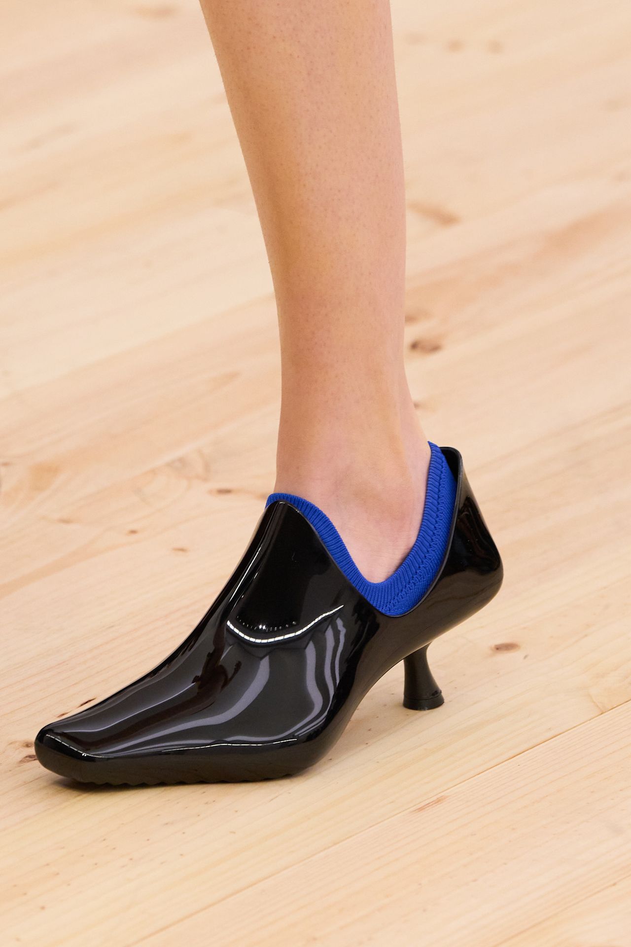 shiny plastic kitten heels with contrast socks on the Loewe Spring 2026 runway