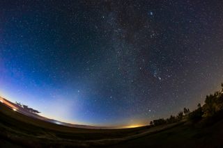 A 360-degree panorama of the spring sky over the Badlands of Dinosaur Provincial Park, Alberta, on March 29, 2019, with the winter Milky Way and constellations setting at centre, and the spring constellations filling the sky at left and right. At centre is also the tapering pyramid-shaped glow of the Zodiacal Light, which continues to the left across the sky as the Zodiacal Band.