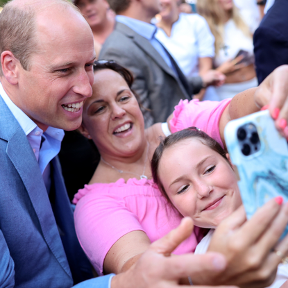 Prince William, Prince of Wales poses for selfies with members of the public as he visits Pret A Manger on September 07, 2023 in Bournemouth, England