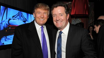 Donald Trump and Piers Morgan pose for a picture 