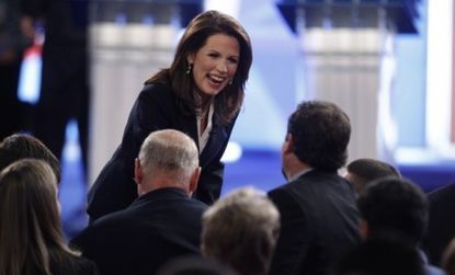 Rep. Michele Bachmann (R-Minn.) shakes hands after the GOP presidential debate Monday, in which the Tea Party favorite came off personable and confident.