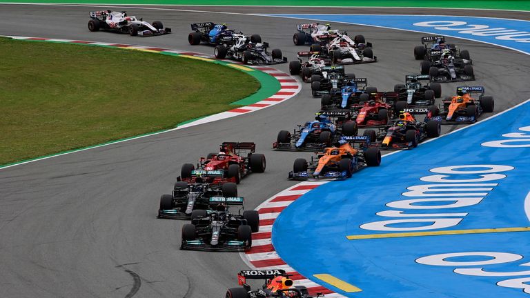 Red Bull's Dutch driver Max Verstappen leads at the start of the Spanish Formula One Grand Prix race at the Circuit de Catalunya on May 9, 2021