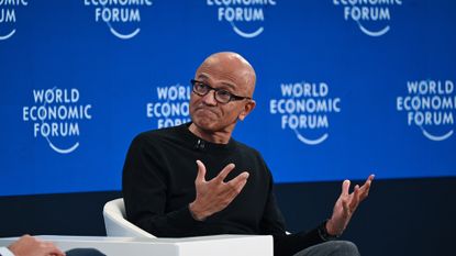 A telephoto shot of Satya Nadella, CEO at Microsoft, speaking at the 2026 World Economic Forum in Davos.