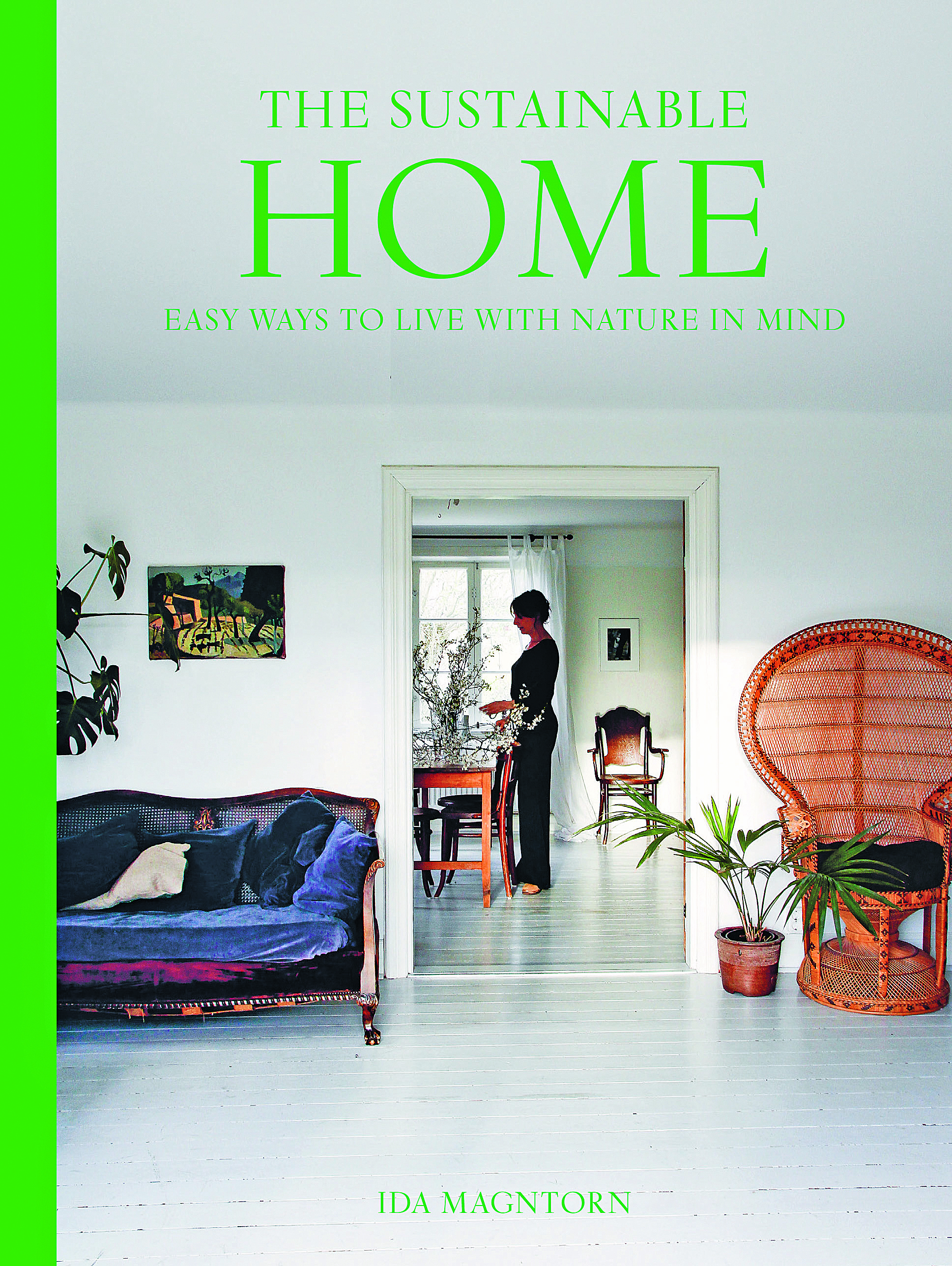 Book cover of The Sustainable Home with White living room and dining room 