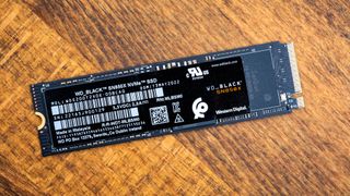 WD Black SN850X SSD on a wooden table