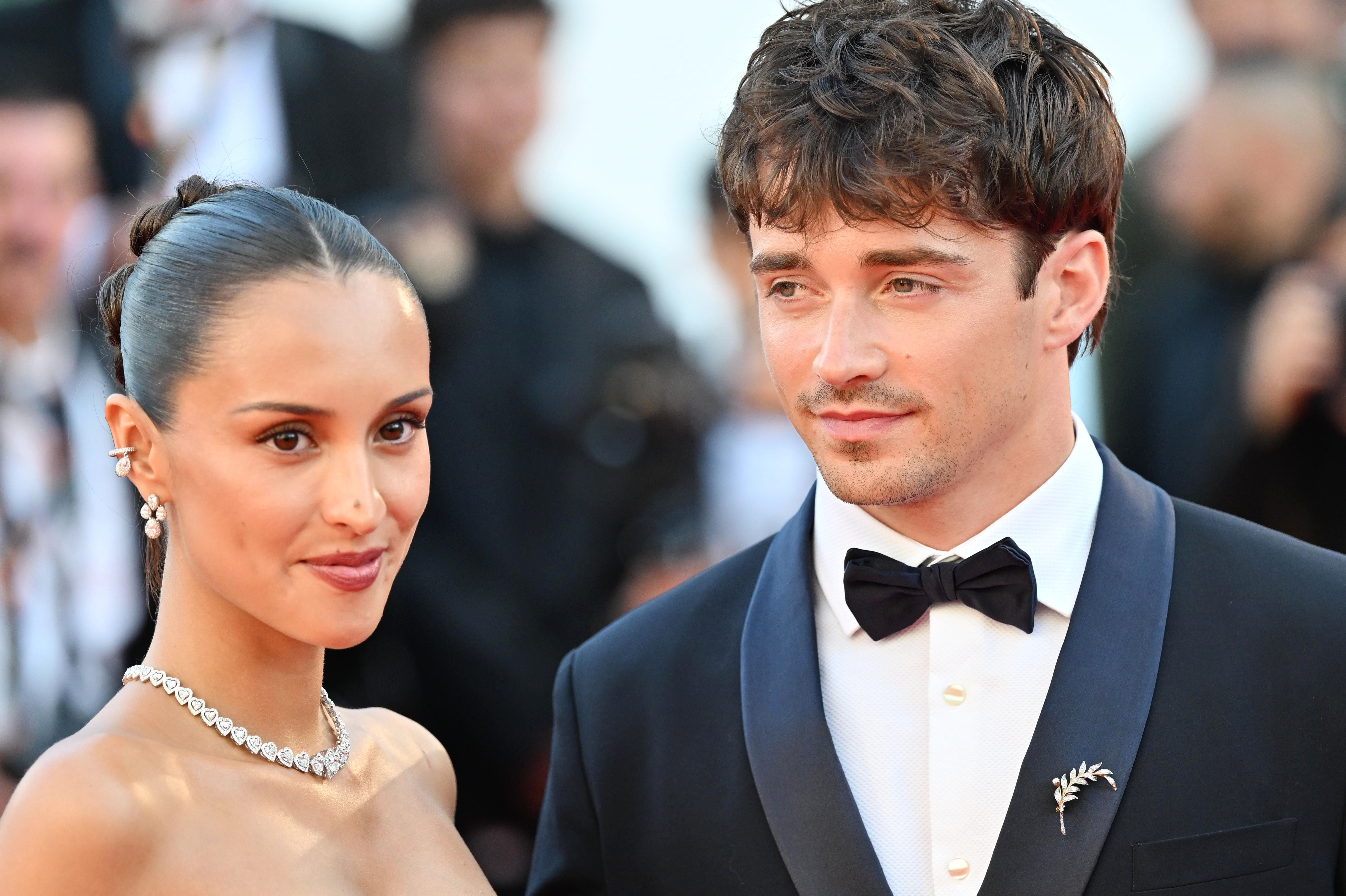 Charles and Alexandra Leclerc pose together at the 2026 Cannes Film Festival in red carpet looks