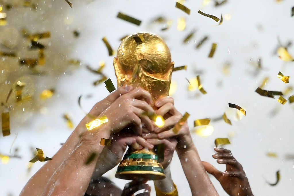 France&#039;s players lift the Fifa World Cup trophy after the Russia 2018 World Cup final football match between France and Croatia at the Luzhniki Stadium in Moscow on July 15, 2018. - France won the World Cup for the second time in their history after beating Croatia 4-2 in the final in Moscow&#039;s Luzhniki Stadium on Sunday. (Photo by Jewel SAMAD / AFP) / RESTRICTED TO EDITORIAL USE - NO MOBILE PUSH ALERTS/DOWNLOADS (Photo credit should read JEWEL SAMAD/AFP via Getty Images)