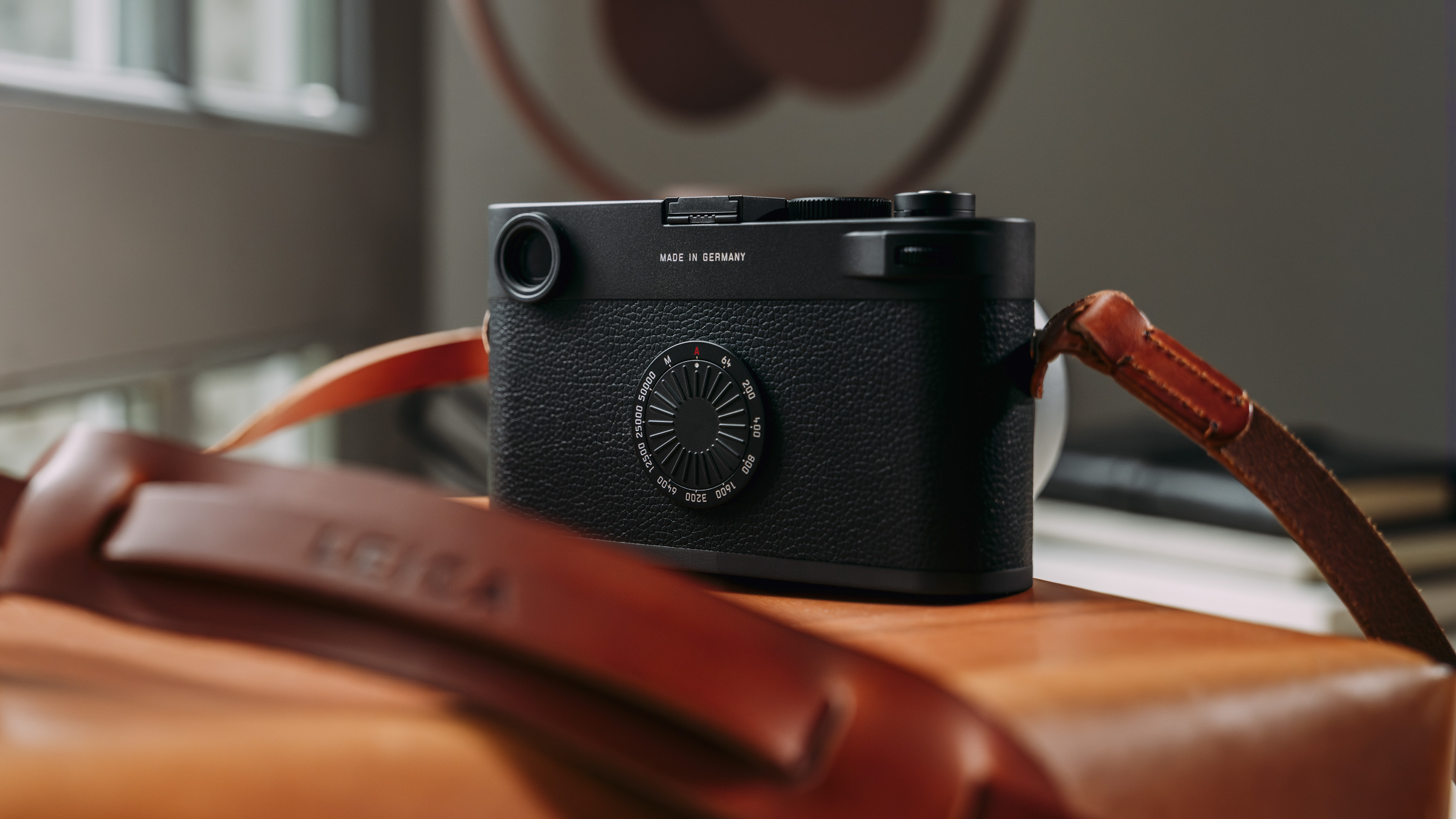 Back ISO dial of the Leica M11-D camera on a table