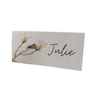 place card with a pressed flower