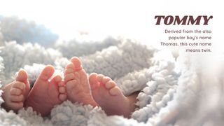 Two pairs of baby feet sticking out of a blanket next to name Tommy on the popular baby names list