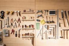 Various DIY tools arranged on the wall 