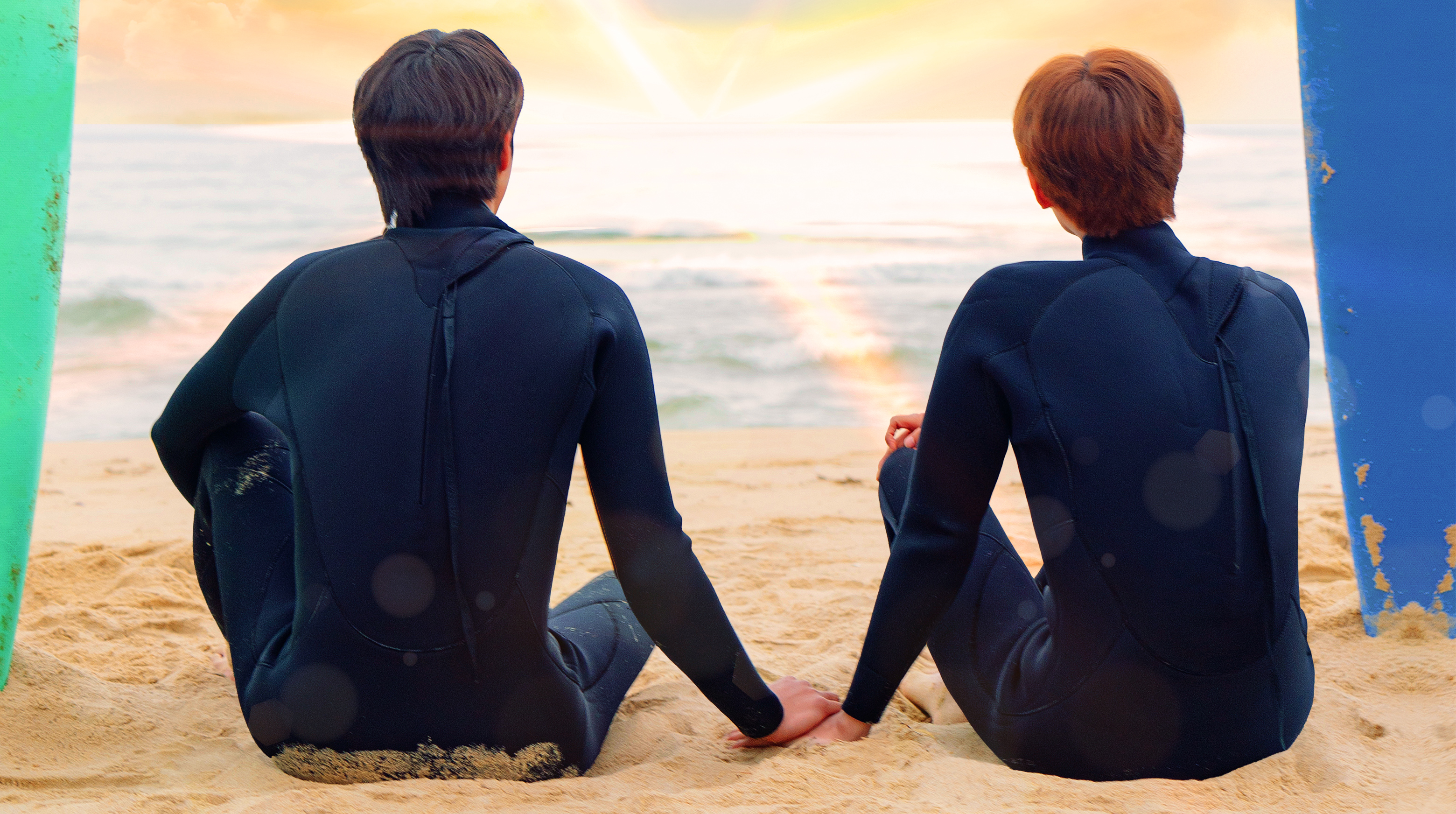 two men in wet suits sit on a beach by surf boards looking out into the ocean in a still from the bl kdrama the eighth sense