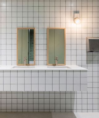 Bathrooms with white tiles