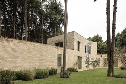 brick facade of Mexican retreat casa jajalpa by lanza