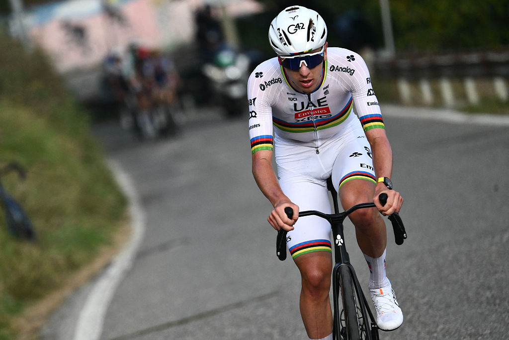 UAE Team Emirates&amp;rsquo;s Slovenian rider Tadej Pogacar attacks to take the lead, in the Passo Di Ganda ascent during the 119th edition of the Giro di Lombardia (Tour of Lombardy), a 238km cycling race from Como to Bergamo on October 11, 2025. (Photo by Marco BERTORELLO / AFP)