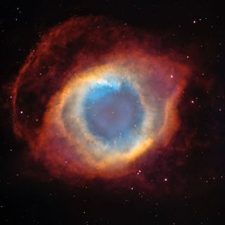 The Helix Nebula, a planetary nebula in the constellation Aquarius also known as the "Eye of God."