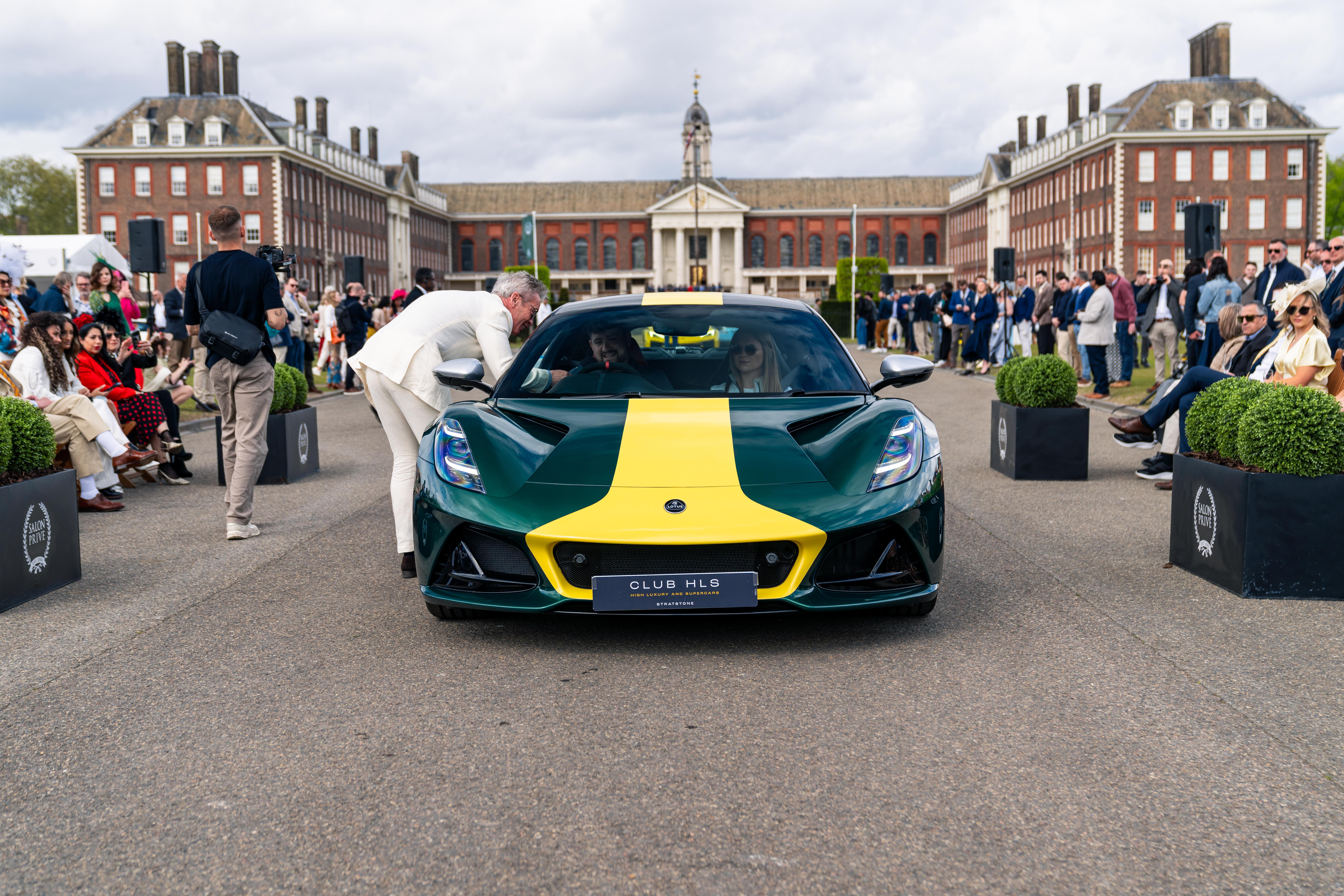 A lotus emira in traditional jim clark colours
