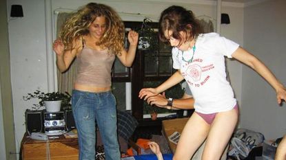 friends jumping on trampoline 