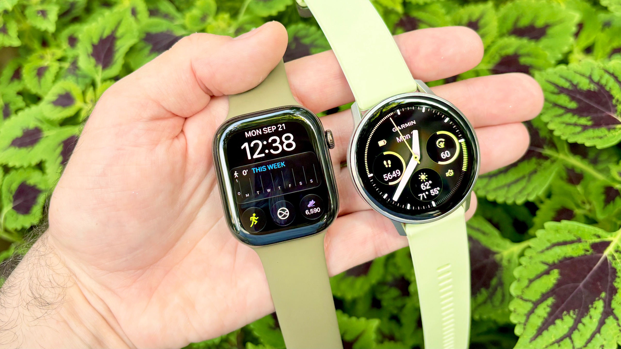 Close-up of the Apple Watch Series 12 next to the Garmin Venu 4