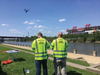 Paul Medeiros (L) and Paul Tierney of WJAR-TV in Providence, R.I., put a Sinclair Broadcast Group drone through its paces.