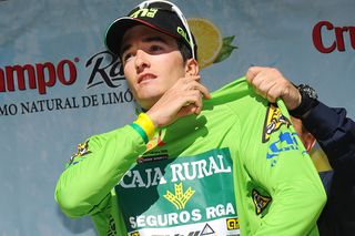 Peio Bilbao (Caja Rural) pulls on the green mountains jersey