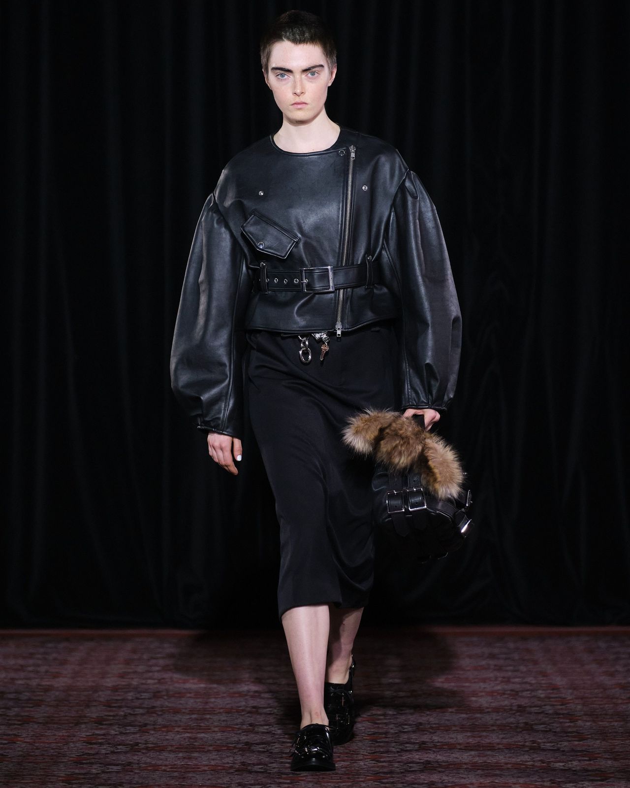 Model walking Simone Rocha A/W 2025 runway