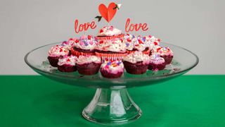 Raised cake stand with red velvet dog cupcakes