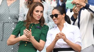 kate middleton meghan markle wimbledon 2019, london, england july 13 catherine, duchess of cambridge and meghan, duchess of sussex in the royal box on centre court during day twelve of the wimbledon tennis championships at all england lawn tennis and croquet club on july 13, 2019 in london, england photo by karwai tanggetty images
