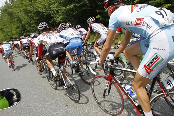 The peloton sticks together behind the break.