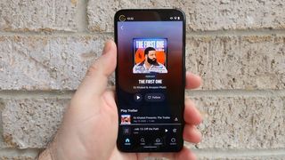 Amazon Music app on an Android phone held in one hand