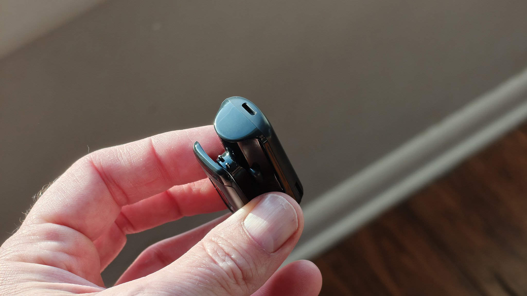 Holding a BoboVR CG2 battery