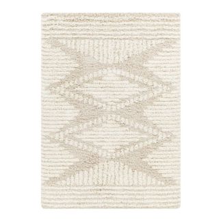 cream rug with beige geometric pattern