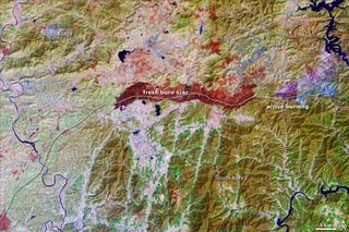This false-color image shows the Korean Demilitarized Zone, a buffer between South and North Korea that was established in 1953.