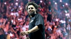 J. Cole performing in 2023