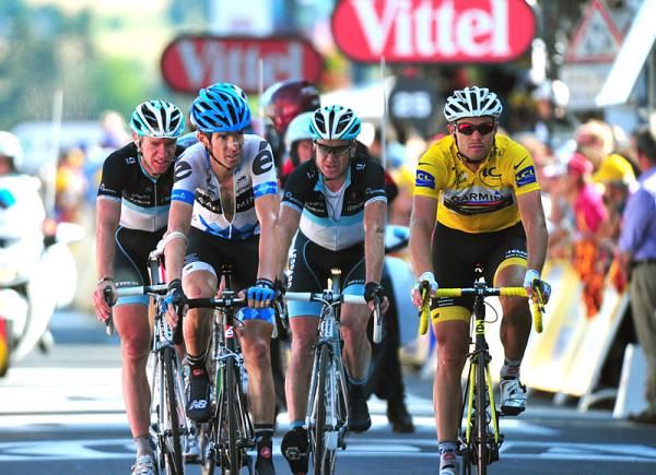 Yellow jersey Thor Hushovd (Garmin-Cervelo) finishes in the company of Jens Voigt (Leopard Trek), David Millar (Garmin-Cervelo) and Stuart O'Grady (Leopard Trek).
